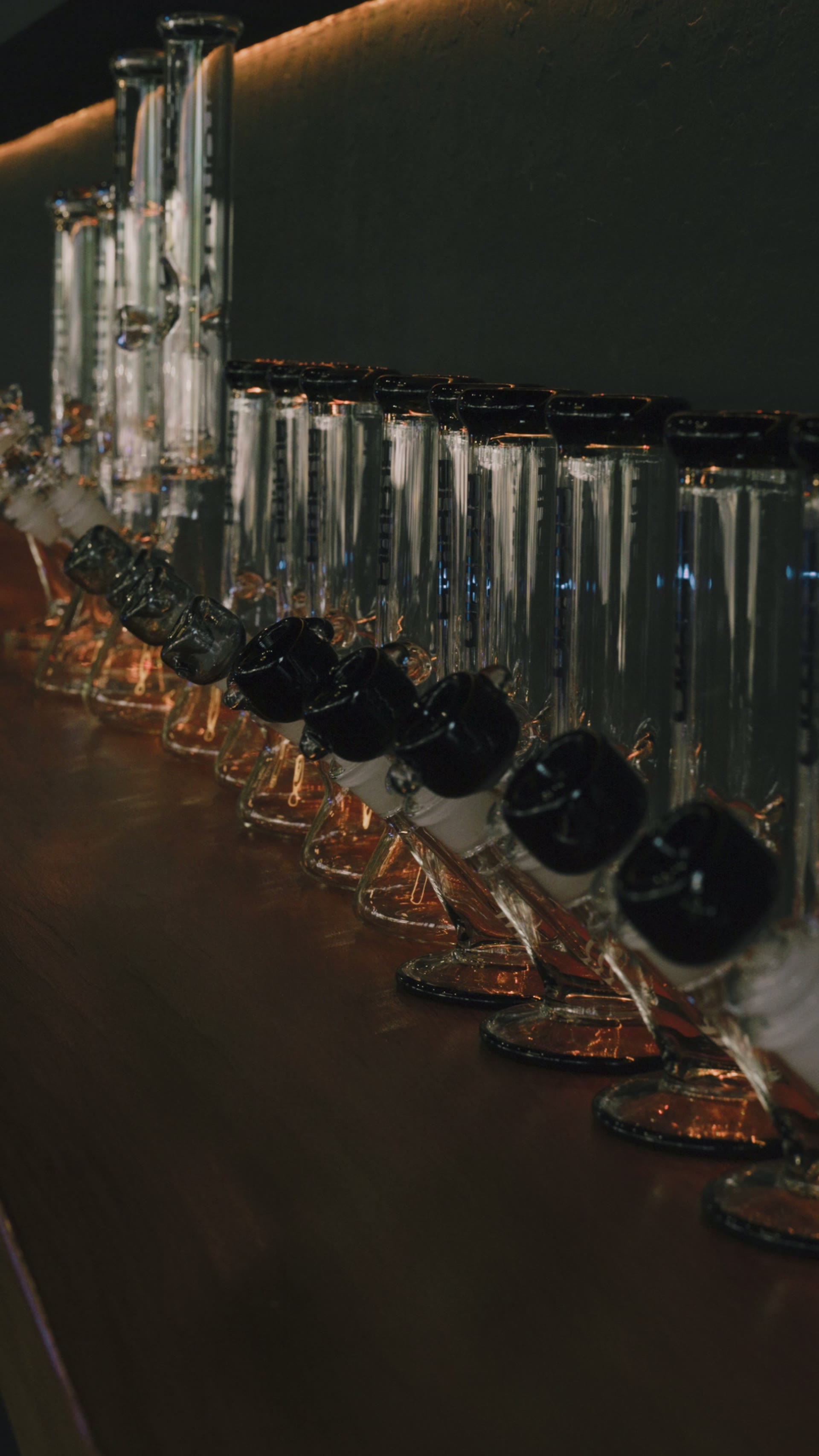 House glass lined up on the bar